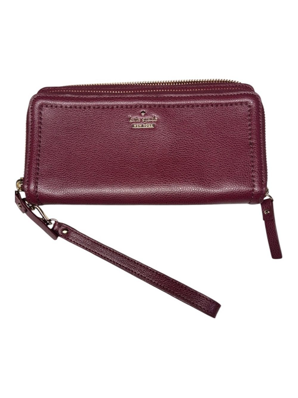 kate spade pebbled leather wristlet in berry
